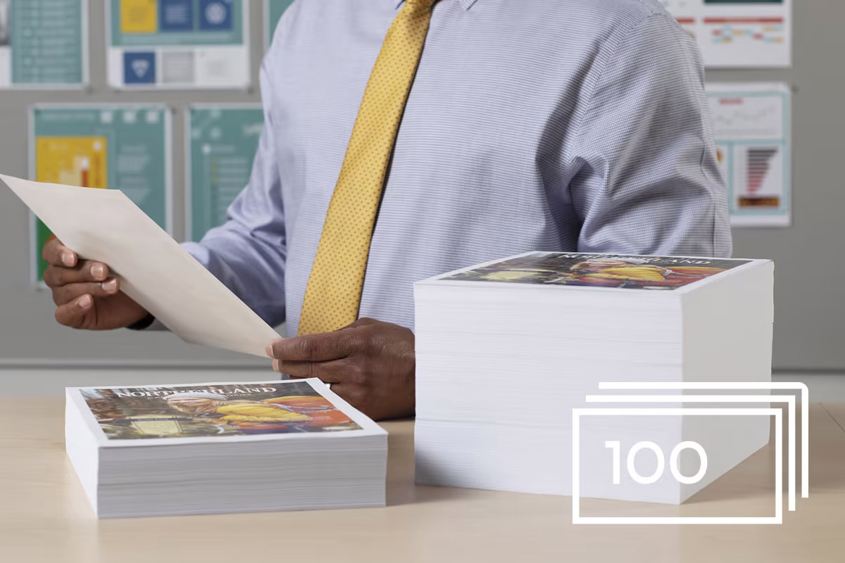 man-reviewing-large-stack-of-printouts-1200x800 man-reviewing-large-stack-of-printouts-1200x800